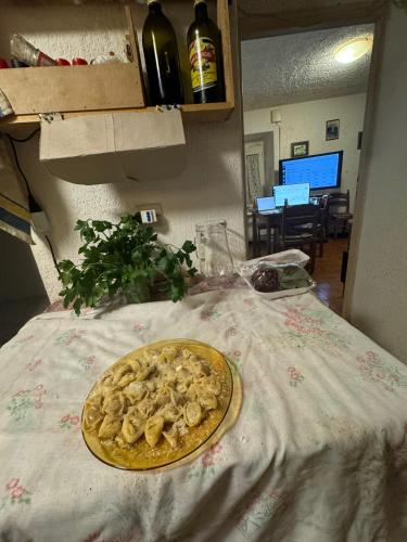 a plate of food sitting on top of a table at Holiday Rome Hub Brigands' Fortress in Rocca Canterano in Canterano