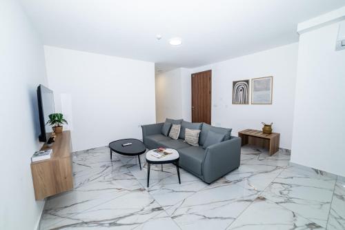 TV a/nebo společenská místnost v ubytování Modern Cosy Fully Equipped Apartment