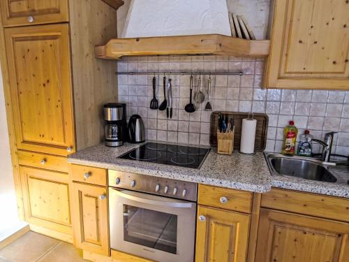 A kitchen or kitchenette at Apartment Haflingerhof Almrose by Interhome