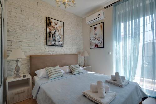 Posteľ alebo postele v izbe v ubytovaní Luxury 2br apartment 50m from beach