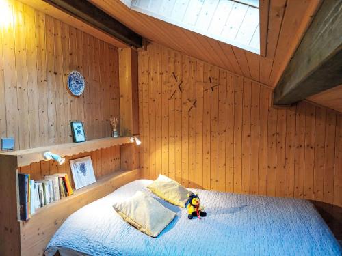 En eller flere senge i et værelse på Apartment Le clos Alpin by Interhome