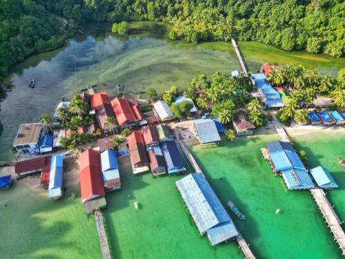 an aerial view of a resort in the water at Ankounamatata in Koh Rong Island