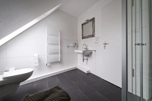 Koupelna v ubytování Heldts Aparthotel