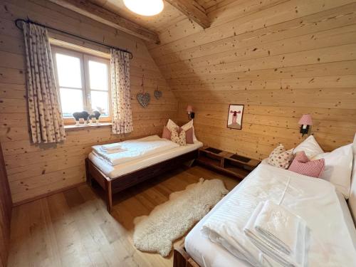 Katil atau katil-katil dalam bilik di Holiday Home st martin chalets-2 by Interhome