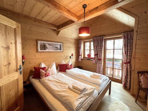 Katil atau katil-katil dalam bilik di Holiday Home st martin chalets-2 by Interhome