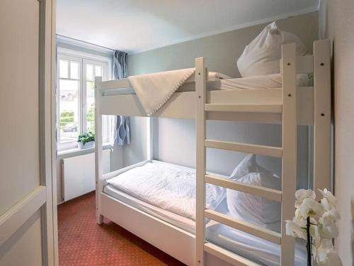 Postel nebo postele na pokoji v ubytování Ostseeferienpark Seepferdchen direkt an der Ostsee - perfekt für Familien