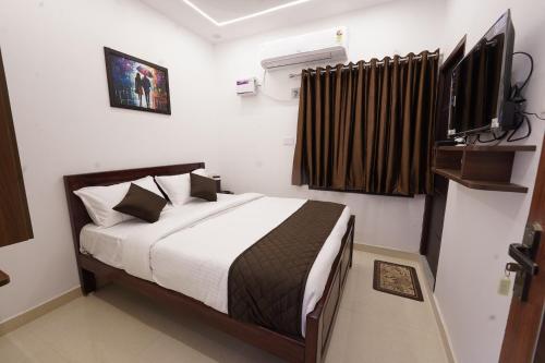 Televisyen dan/atau pusat hiburan di MM Comfort Inn