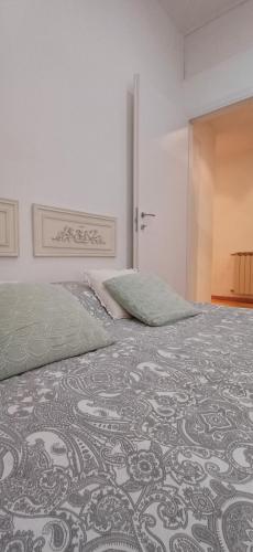 Llit o llits en una habitació de CA' MATI Alloggio Turistico Vaticano