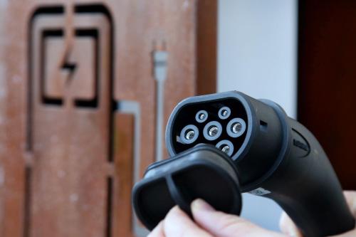 a person holding a video game remote control at Gästehaus Trixl in Zell am See