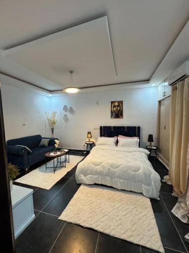 מיטה או מיטות בחדר ב-Residence Imela