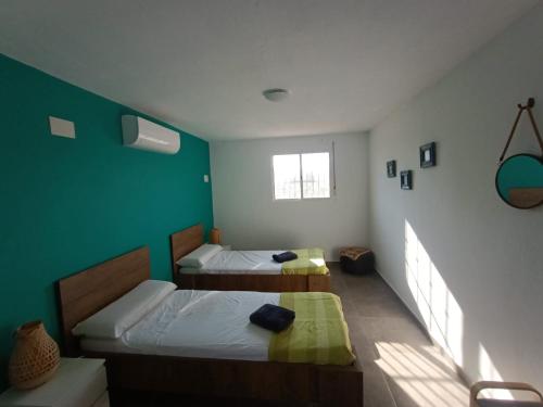 Postel nebo postele na pokoji v ubytování Hostel La Fanega