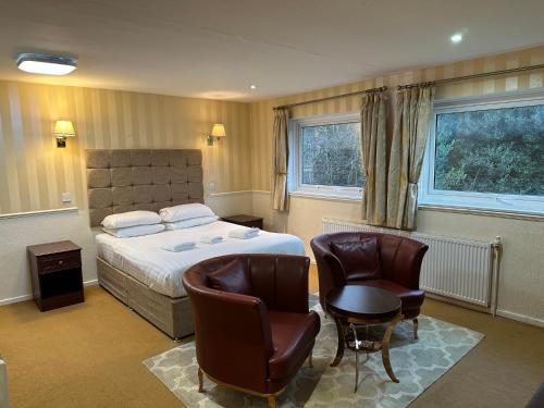 Ένα ή περισσότερα κρεβάτια σε δωμάτιο στο NormanHurst Hotel