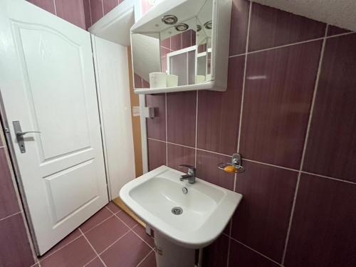 Ein Badezimmer in der Unterkunft Apartments and Rooms Vicko