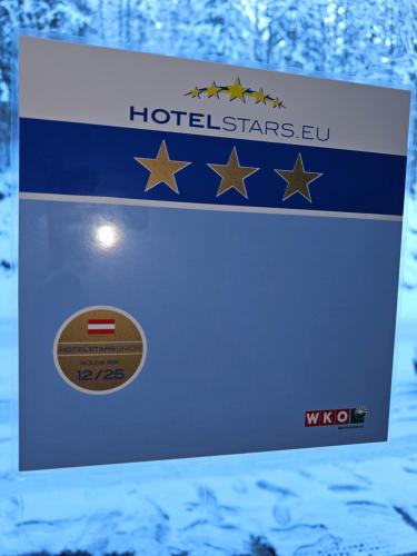 a box with a flag and stars on it at Kurhotel Renona Rehabilitation in Semmering