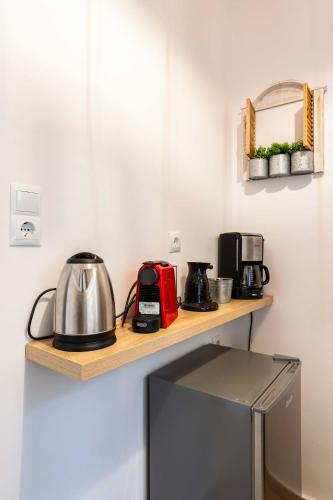 Η κουζίνα ή μικρή κουζίνα στο Elena's Cozy & Central Nest