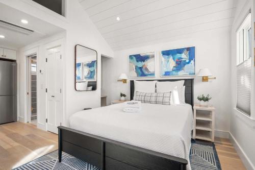 a bedroom with a large bed in a room at Walk to Beach Shopping and Dining in Provincetown
