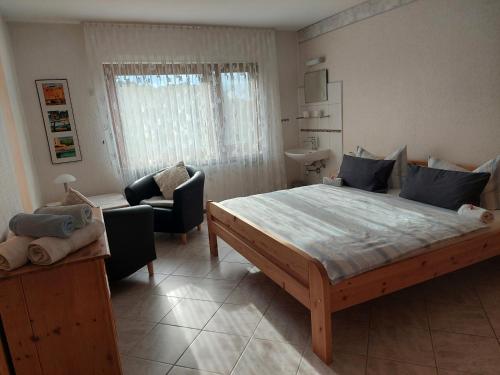 Katil atau katil-katil dalam bilik di Ferienwohnung-Pension Osterwiese