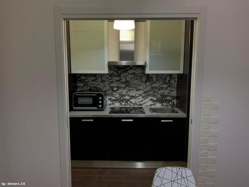 A kitchen or kitchenette at Dimora 14