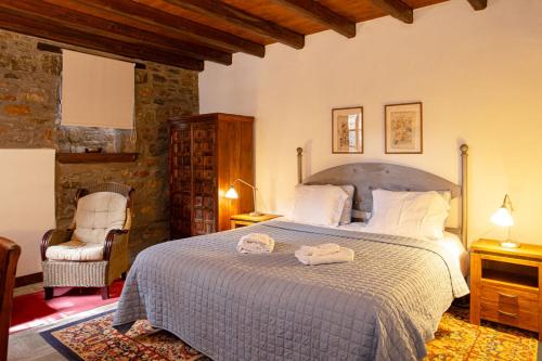 Postel nebo postele na pokoji v ubytování Palio Eleotrivio Guesthouse