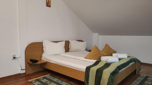 Letto o letti in una camera di MOTEL PRISLOP