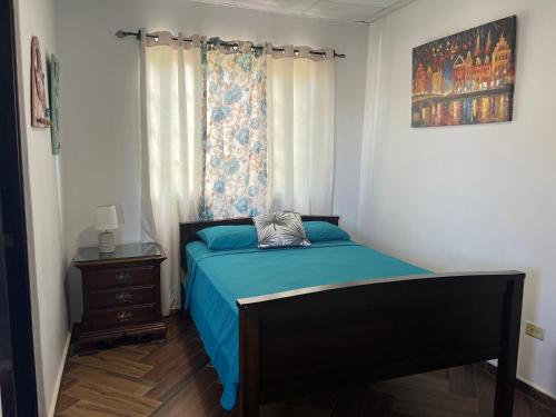 Ένα ή περισσότερα κρεβάτια σε δωμάτιο στο La Casita de Elenita - Habitación doble