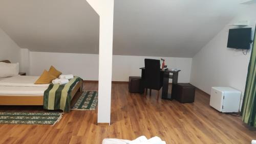 Letto o letti in una camera di MOTEL PRISLOP