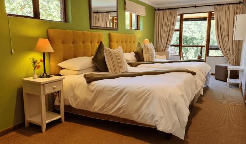Postel nebo postele na pokoji v ubytování Pumula Lodge 4 Star Guesthouse Knysna