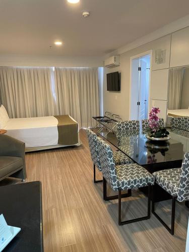 Телевизор и/или развлекательный центр в Plaza Inn American Loft - Barra Funda