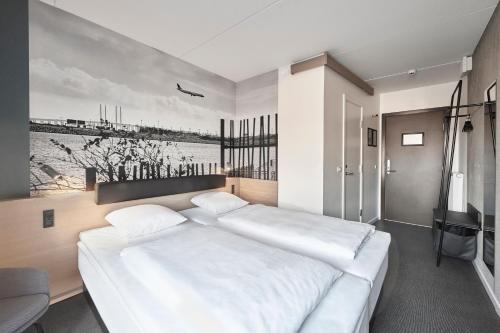 Postel nebo postele na pokoji v ubytování Four Points Flex by Sheraton Copenhagen Airport