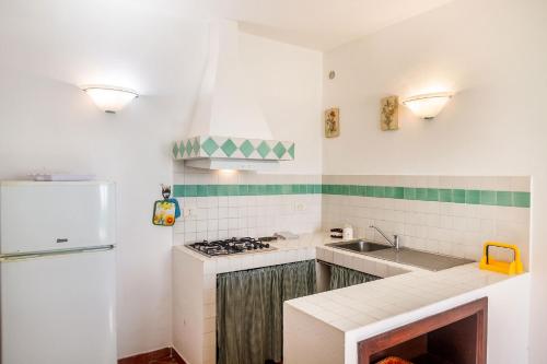 Kuchyň nebo kuchyňský kout v ubytování Villa Bel Giardino