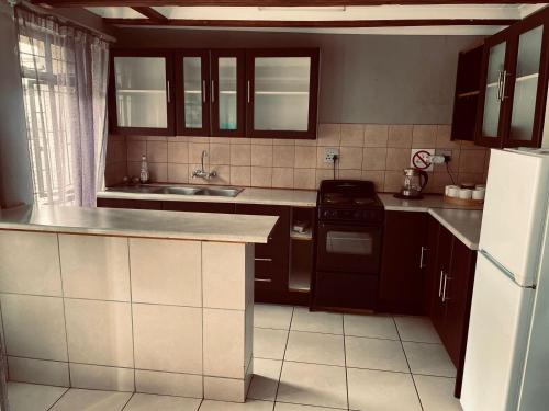 Dapur atau dapur kecil di Nooitgedacht Town Lodge