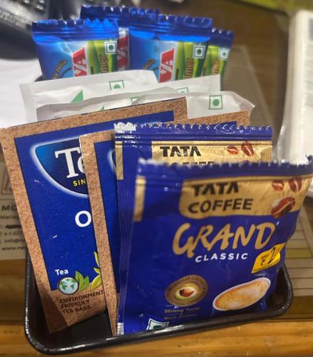 a group of bags of chips on a table at New Hotel Suhail in Hyderabad