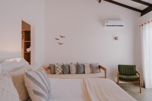 Postel nebo postele na pokoji v ubytování Aqualtune Pousada