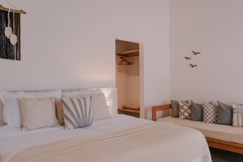 Postel nebo postele na pokoji v ubytování Aqualtune Pousada
