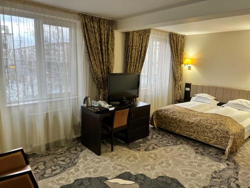 Katil atau katil-katil dalam bilik di Hotel Bistrita