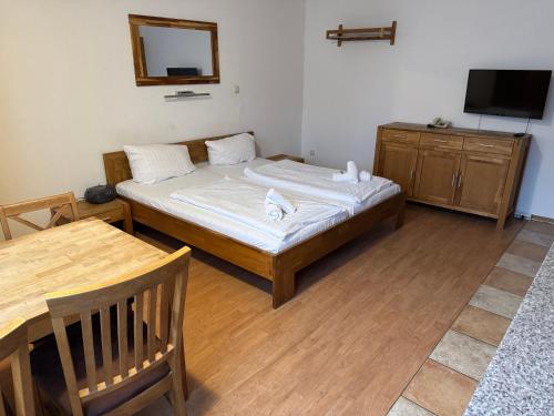Katil atau katil-katil dalam bilik di Alcor Hotel Feriendorf an der Ostsee