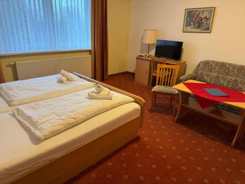 Katil atau katil-katil dalam bilik di Alcor Hotel Feriendorf an der Ostsee