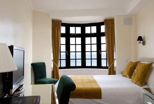 Katil atau katil-katil dalam bilik di Royal Hotel (Adults Only)
