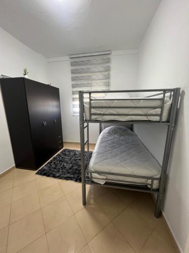 Postel nebo postele na pokoji v ubytování Appartement spacieux & lumineux