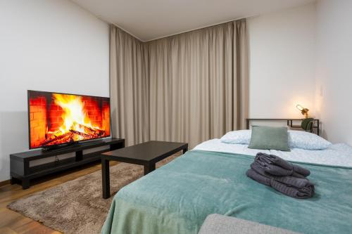 Ένα ή περισσότερα κρεβάτια σε δωμάτιο στο Waterfront City Azure Loft with FREE PARKING