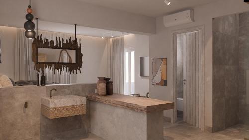 a large bathroom with a sink and a mirror at F Fine Suites - Adults Only in Líndos