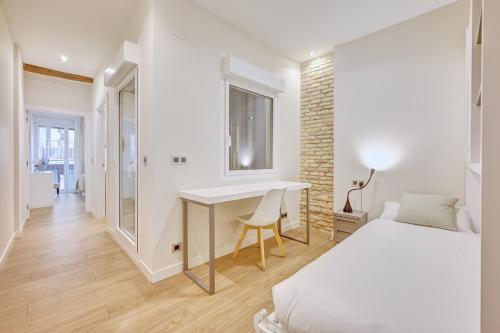 Ένα ή περισσότερα κρεβάτια σε δωμάτιο στο Edificio Joya by Clabao