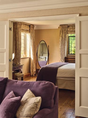 Кровать или кровати в номере Le Manoir aux Quat'Saisons, A Belmond Hotel, Oxfordshire