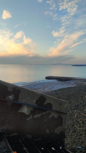 a view of the beach with the ocean in the background at Mira Capri in Castellammare di Stabia