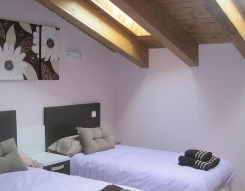 Ένα ή περισσότερα κρεβάτια σε δωμάτιο στο Casa Los Barruecos