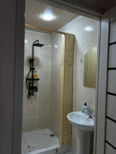 a bathroom with a shower and a sink at MM HOUSE Stepanavan in Stepʼanavan