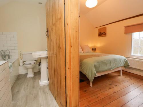 Et badeværelse på Medlar Cottage