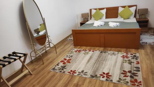 Letto o letti in una camera di MOTEL PRISLOP