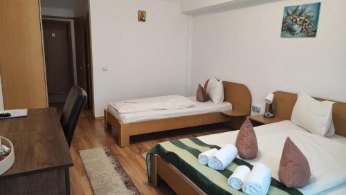 Letto o letti in una camera di MOTEL PRISLOP