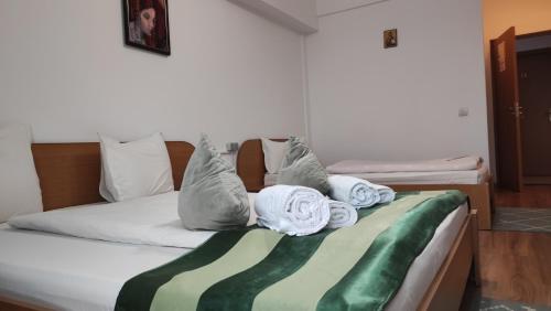 Letto o letti in una camera di MOTEL PRISLOP